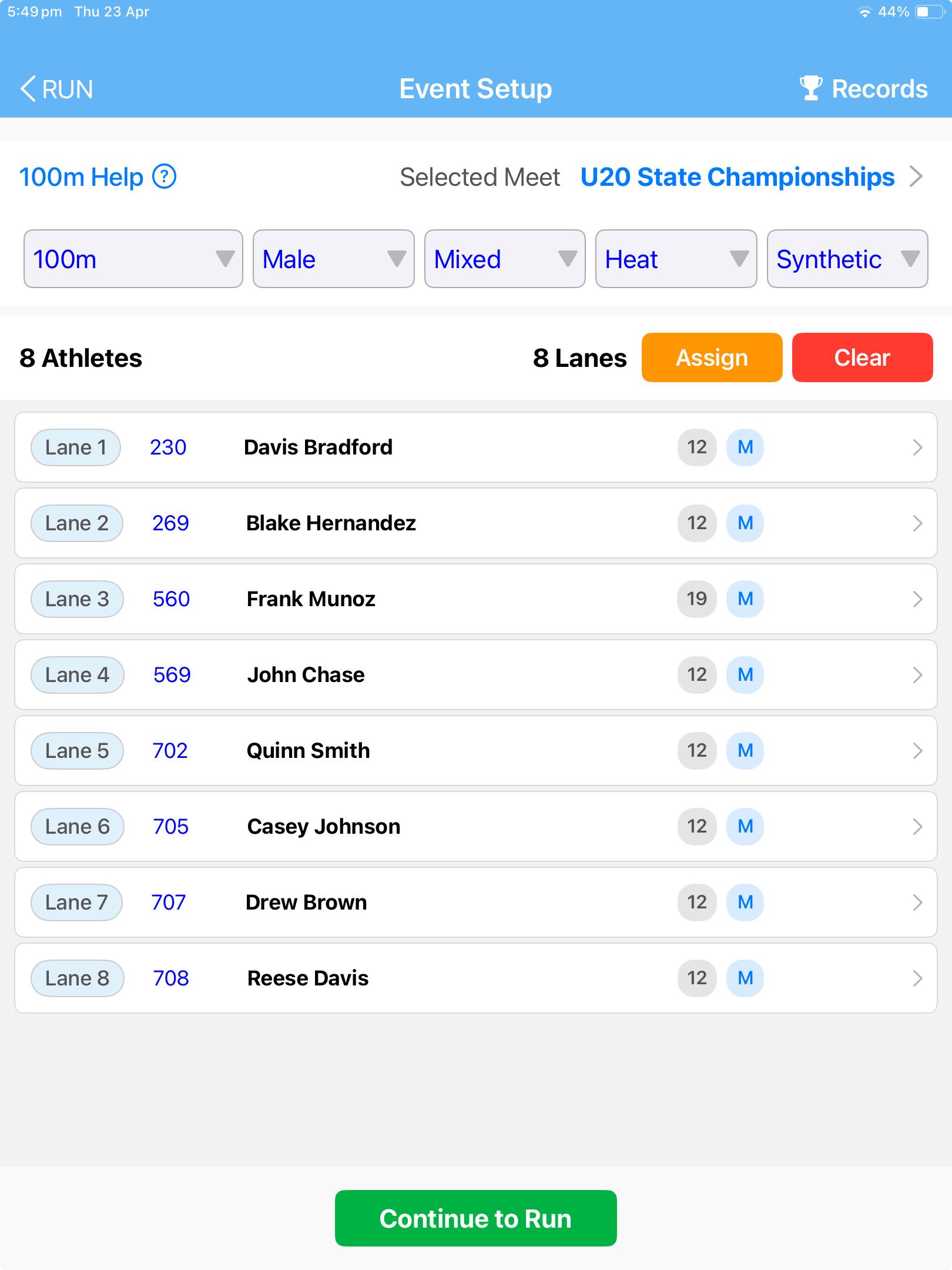 SplitFast Timing App Event Setup page showing 100m Male Mixed Heat for U20 State Championships with 8 athletes assigned to lanes 1 to 8 and Continue to Run button
